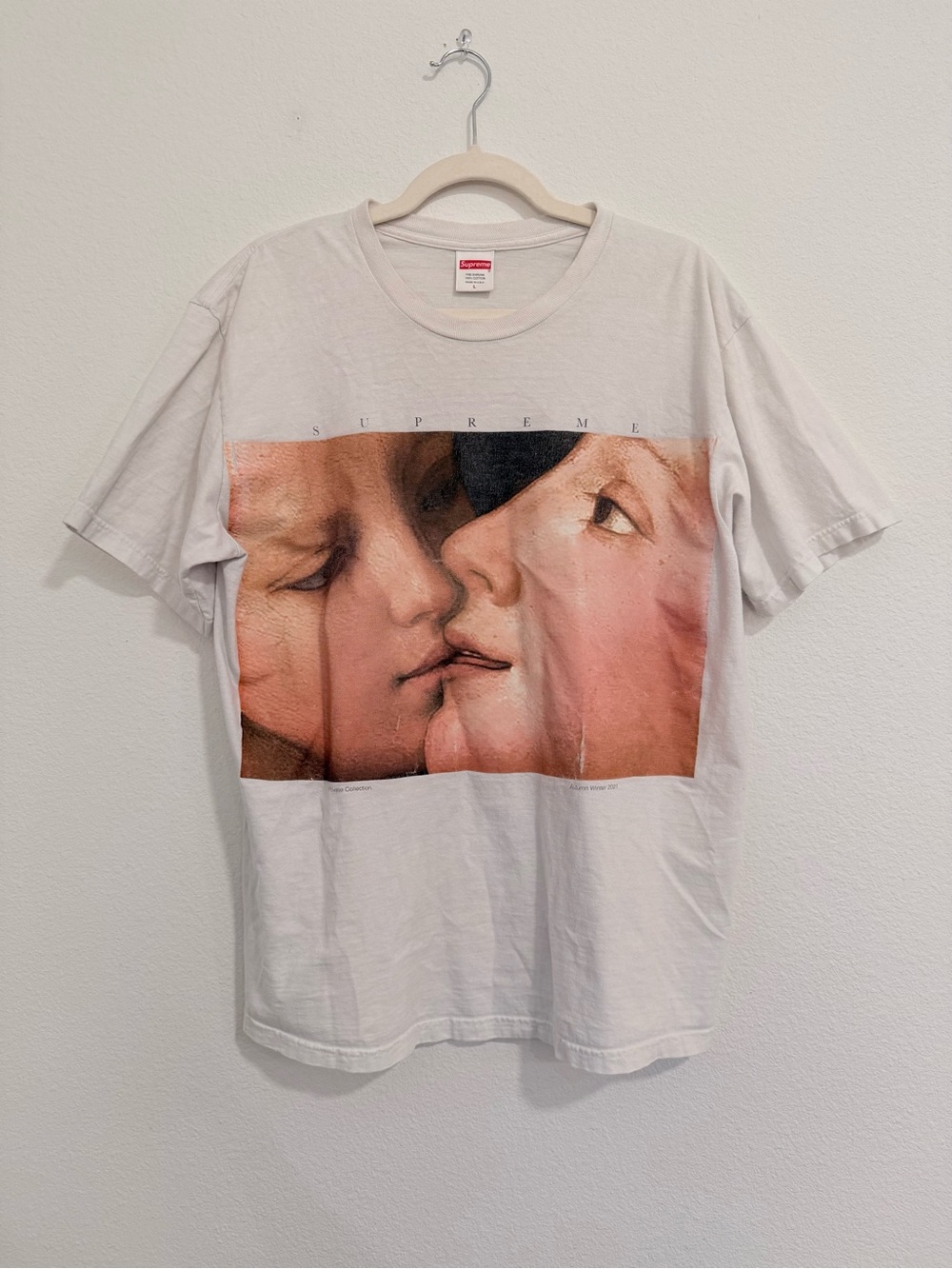 Supreme White Graphic Tee with Faces Print